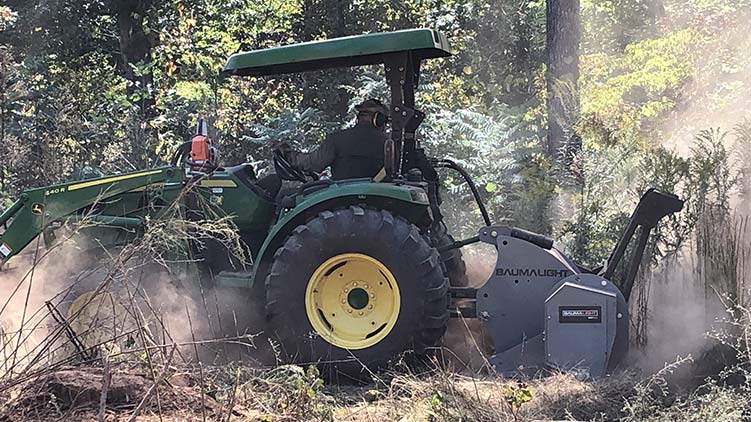 Brush mulcher in clearing action