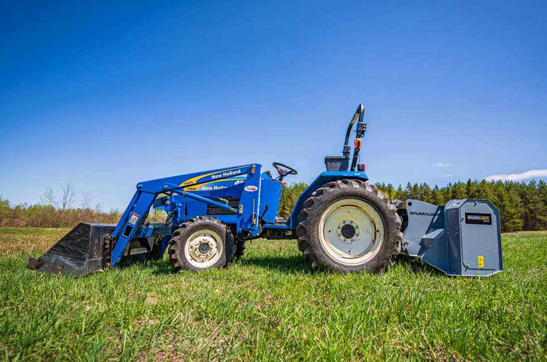 New Holland tractor with Baumalight MP348