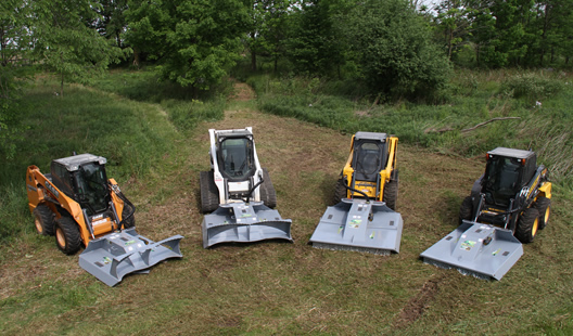 Baumalight skidsteer mounted BrushCutt models line up on cleared area