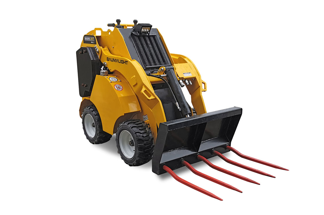 Manure Fork attached to a Skidsteer
