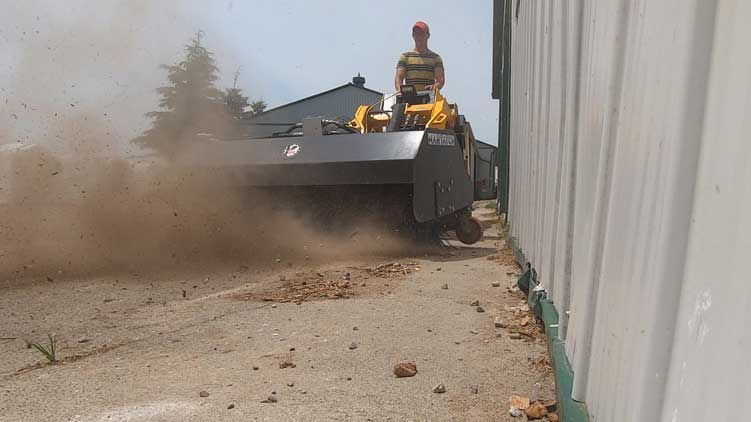 Rotary sweeper attachment in action