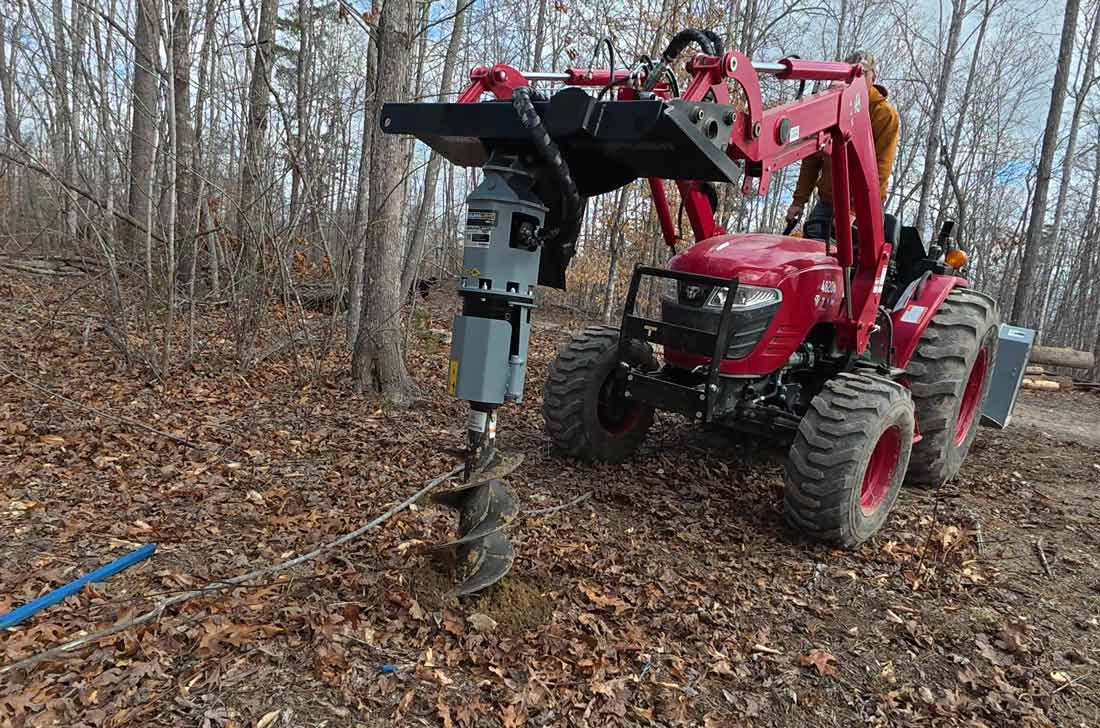 rc582 auger drive mounted on tractor