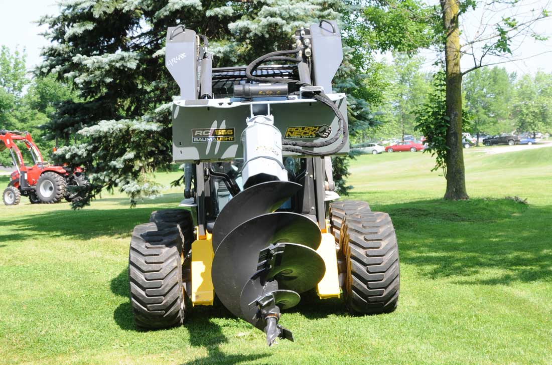 Baumalight Tree auger on skid steer