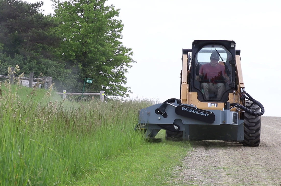 bms230 clearing overgrown roadside brush