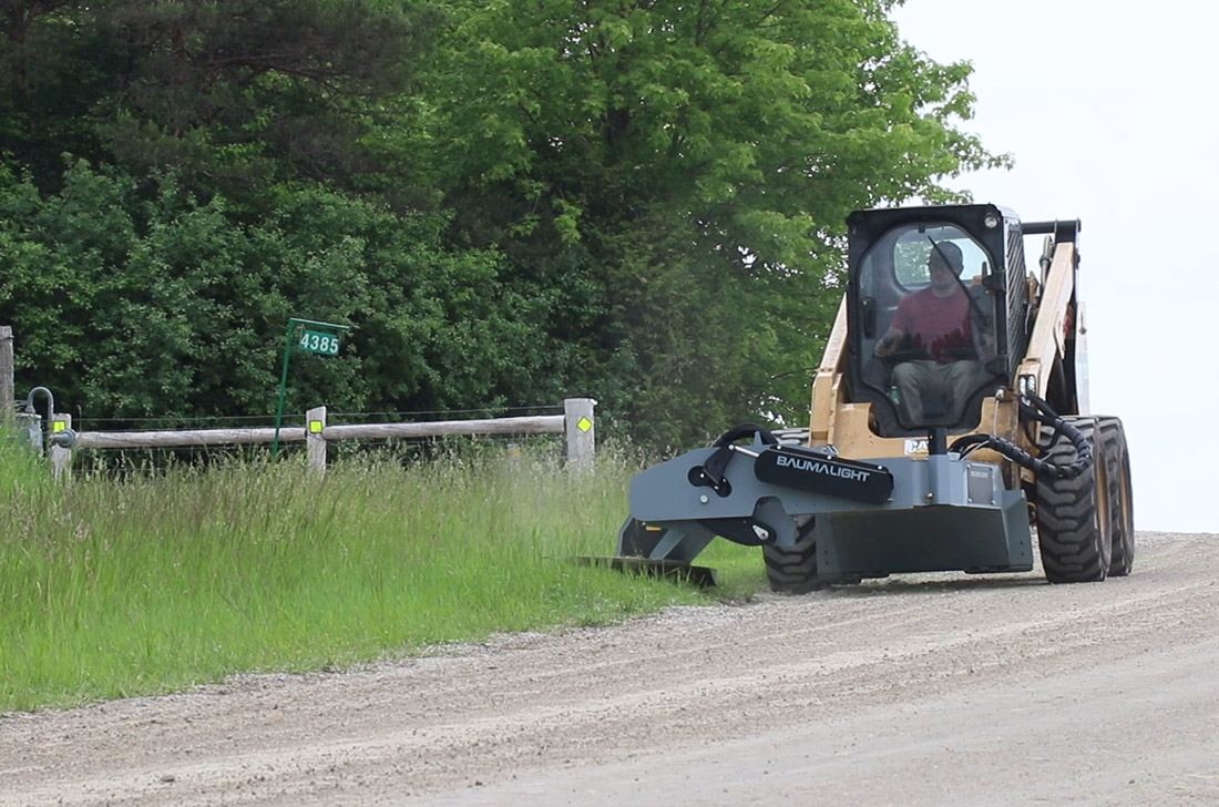 bms230 mowing brushes near guardrail