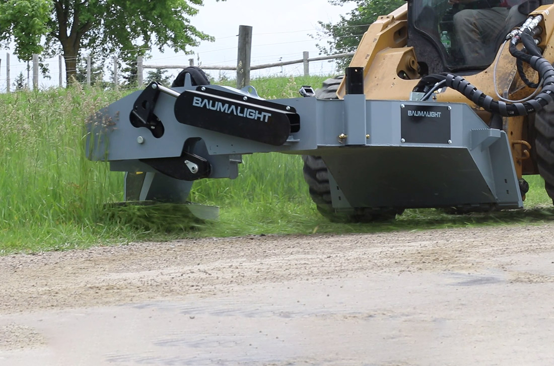 bms230 mowing heavy roadside brush