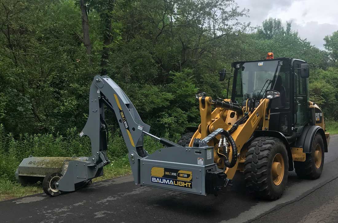 Skid Wing sur chargeuse à pneus CAT