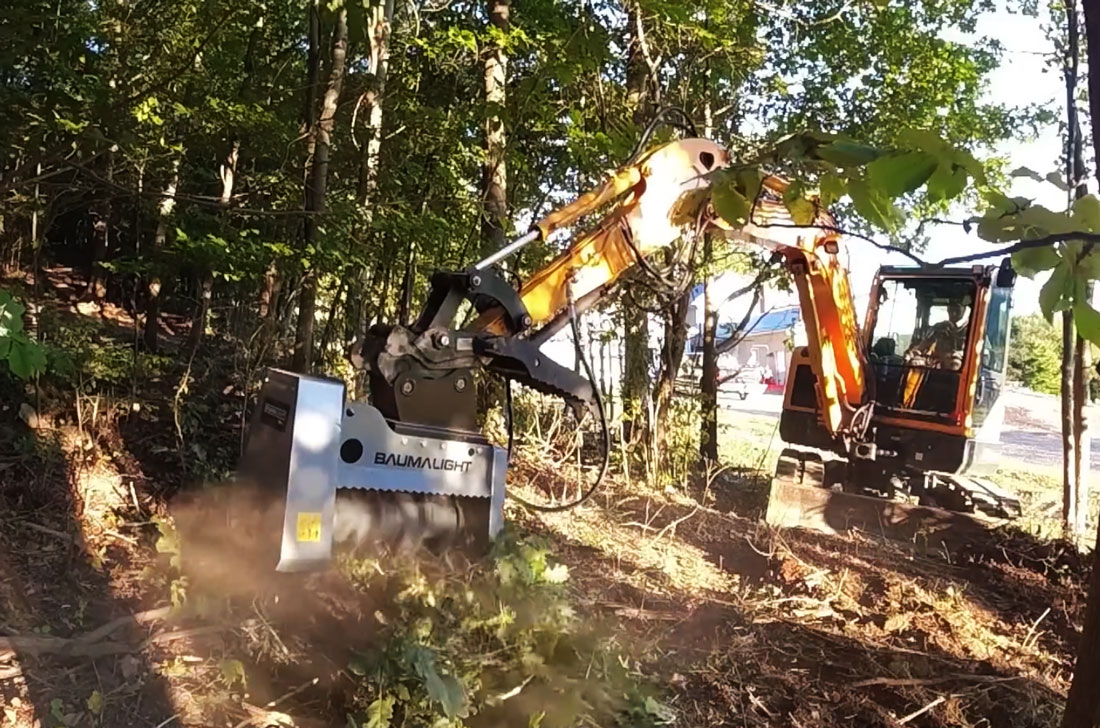 baumalight mx330 mulcher clearing heavy vegetation