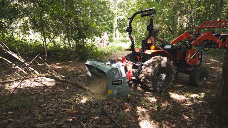 customer with mp360 clearing heavy vegetation