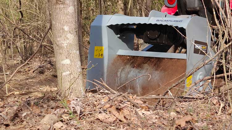 Baumalight integrated brush bar for mulching