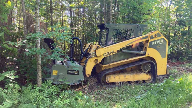 Fixed tooth brush mulcher for skidsteer