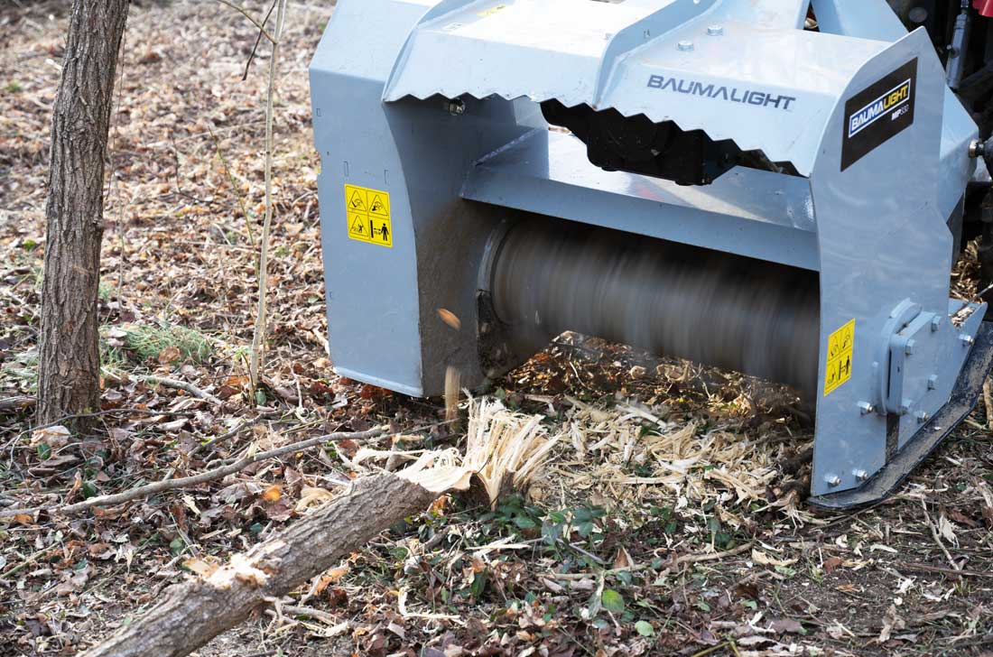 brush mulcher chipping wood material efficiently