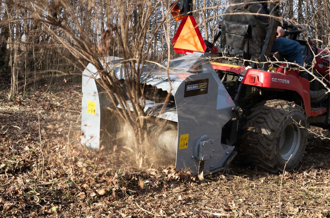 mp330 mulcher working in heavy brush