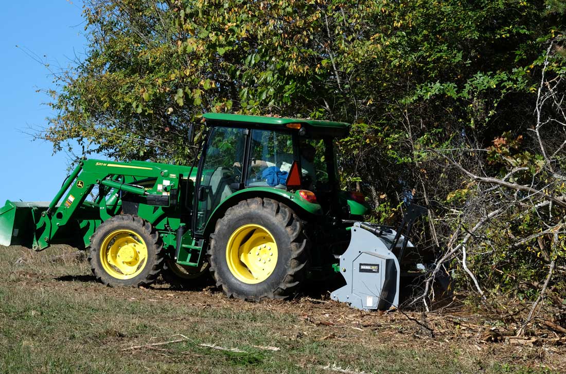 Integrated push bar for taller brush