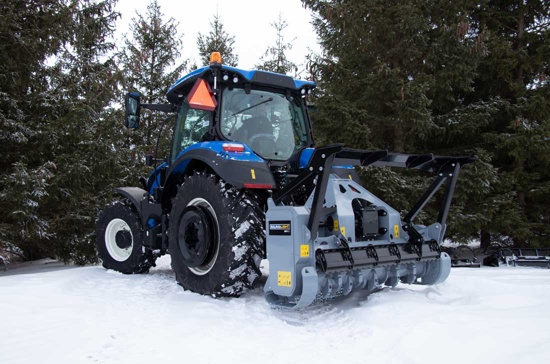 Brush mulcher with adjustable skid shoes