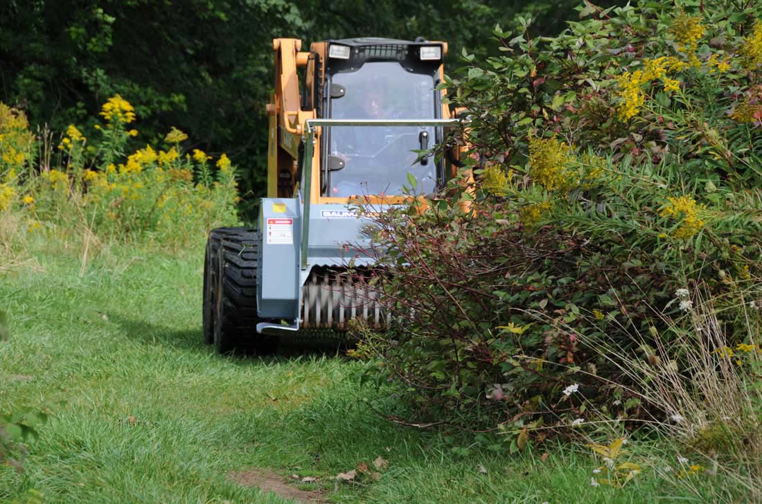 Skid steer mounted brush mulcher