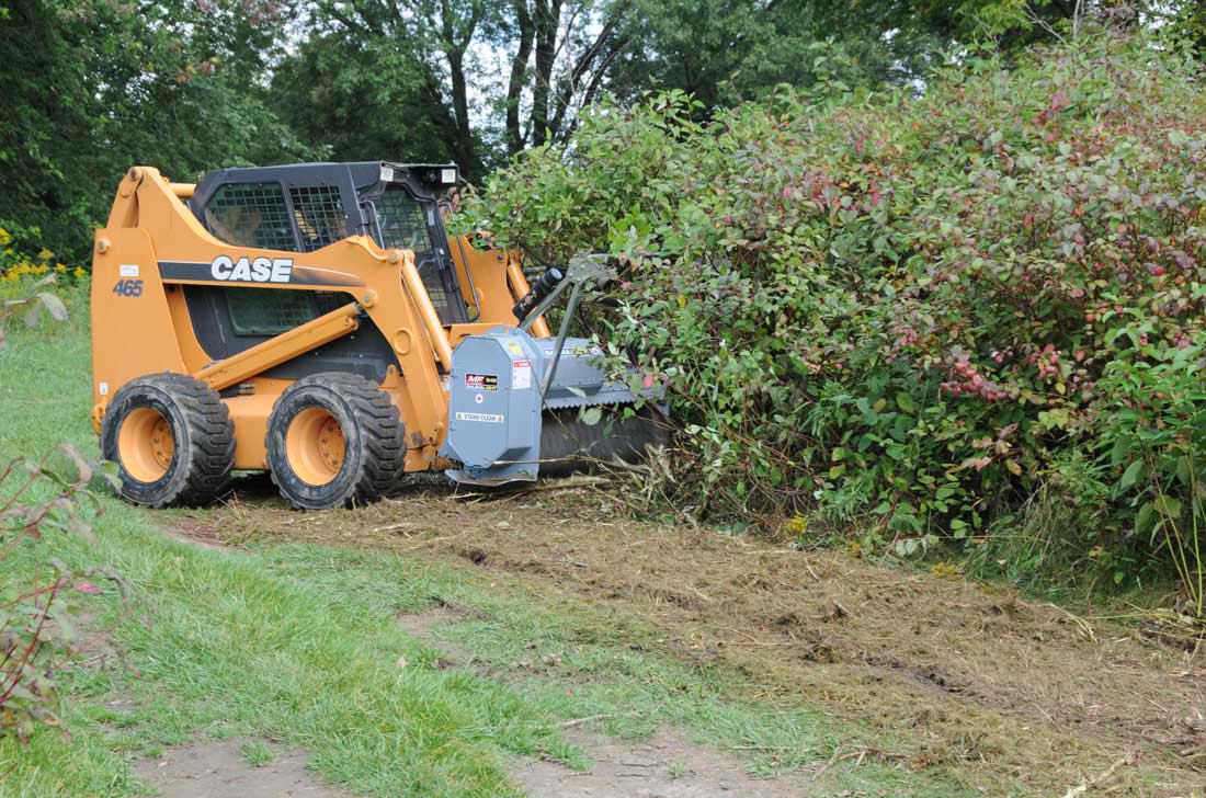 Land clearing with baumalight brush mulcher