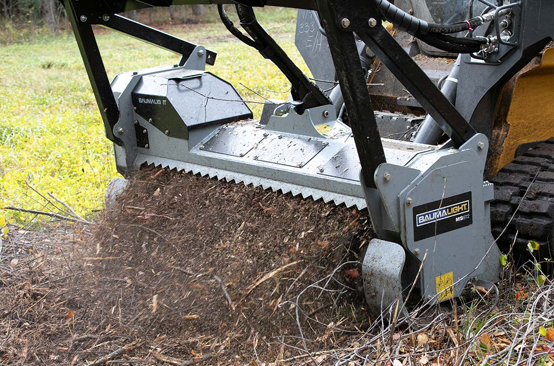 Replaceable skid shoes of MS972 mulcher