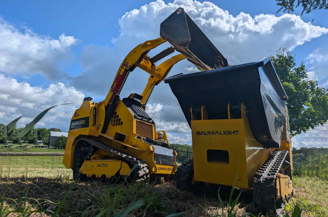 Baumalight mini dumper clearing debris