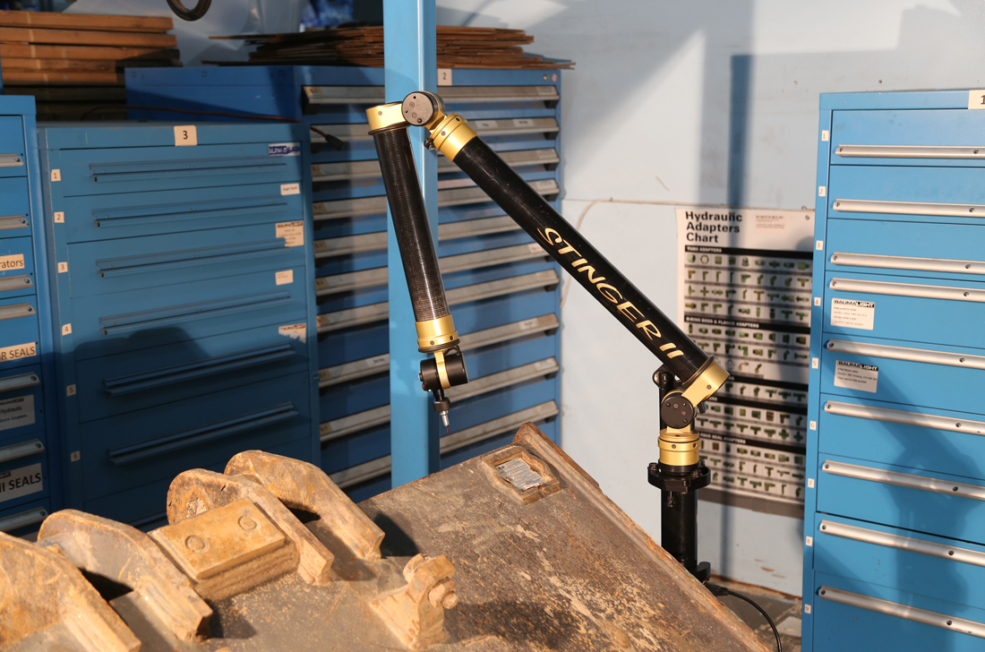 Measuring machine with customer excavator attachment?2