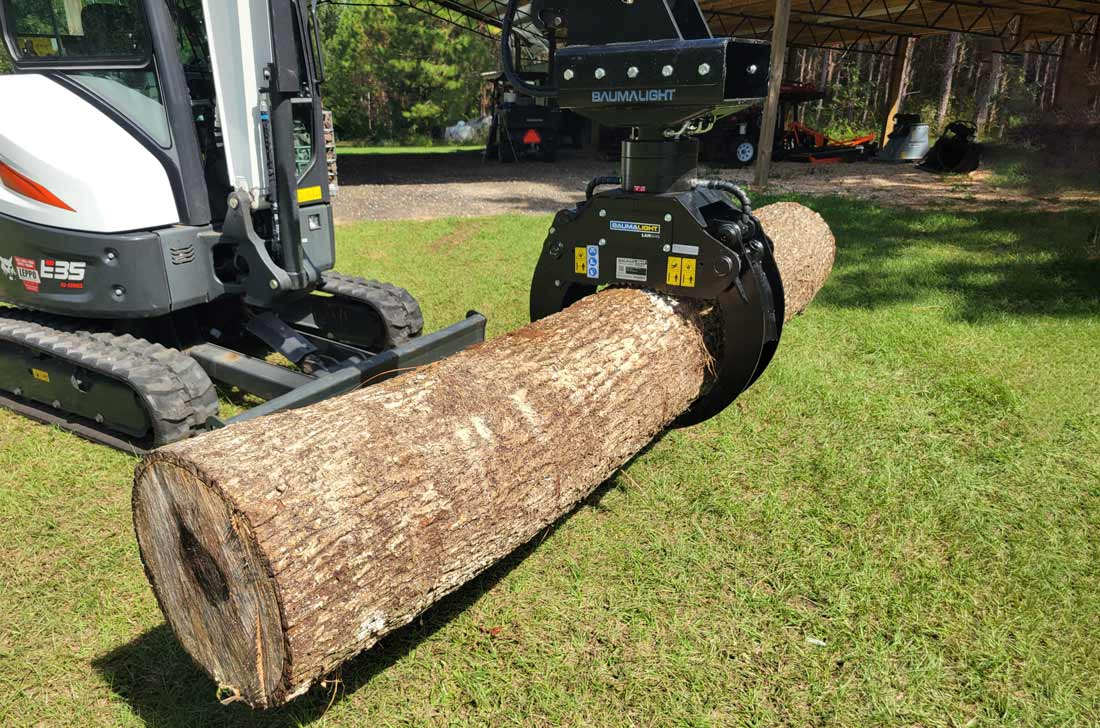 lxr524g log grapple attached to excavator
