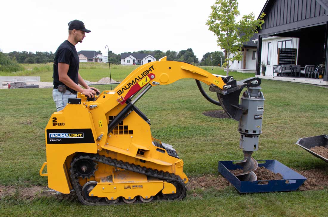 mini tracked loader, kubota engine,baumalight auger drive mounted on trl630d