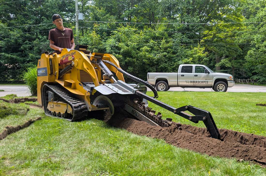 baumalight trencher on trl630d mini skidsteer