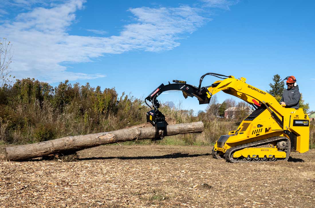 trl740y with log grapple moving logs