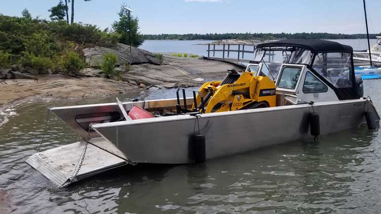 Mini skidsteer loaded on ferry boat