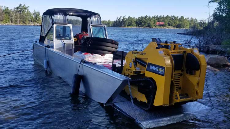 Transporting Baumalight TRL620D compact utility loader