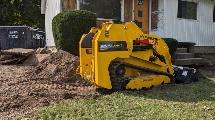 Baumalight TRL630Y onsite with bucket attachment
