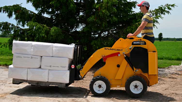 Pallet fork attachment on wheeled miniskidsteer