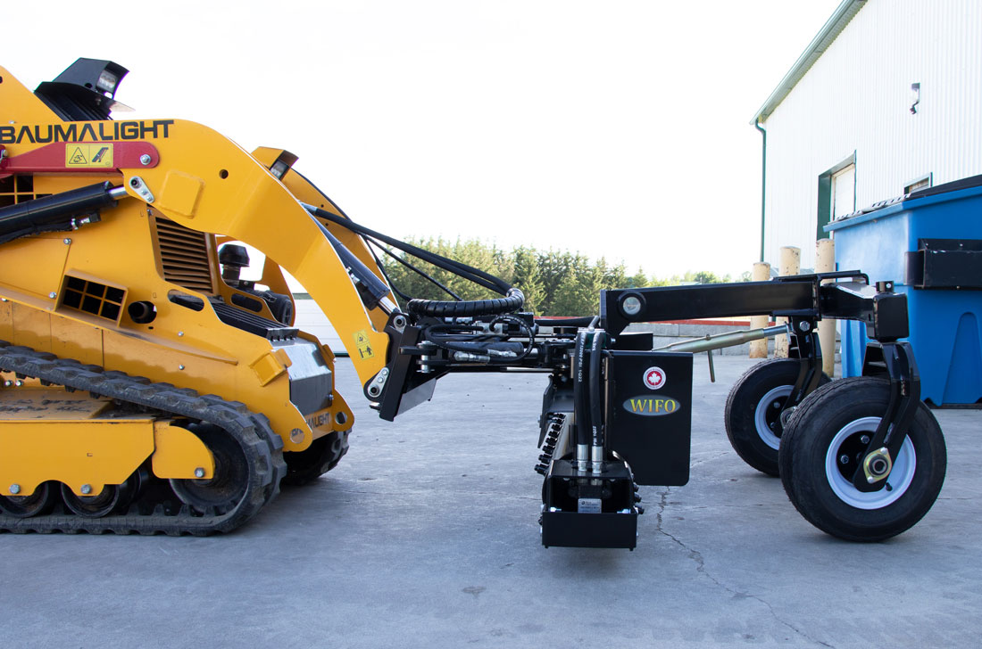 WIFO power rake on mini skidsteer