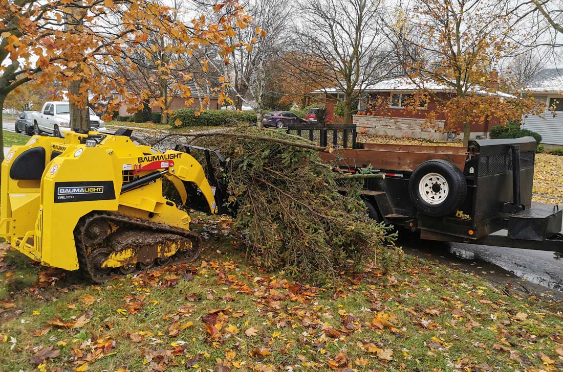 Martatch fork on tracked mini skidsteer