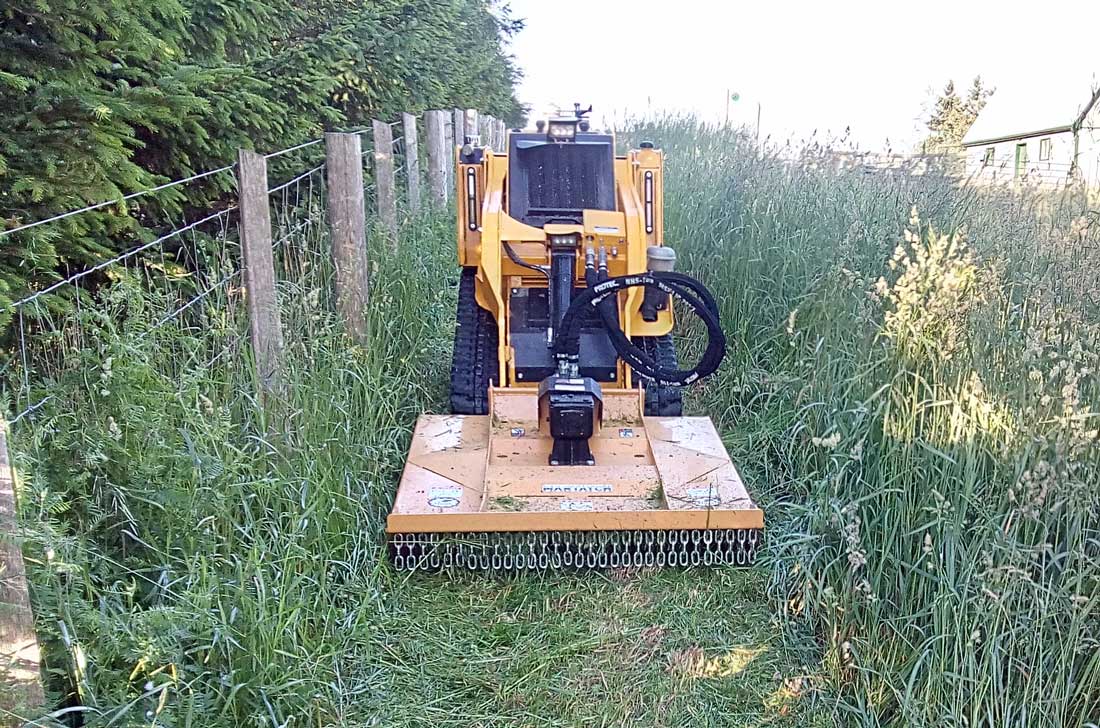 Rotary mower with safety chain guard