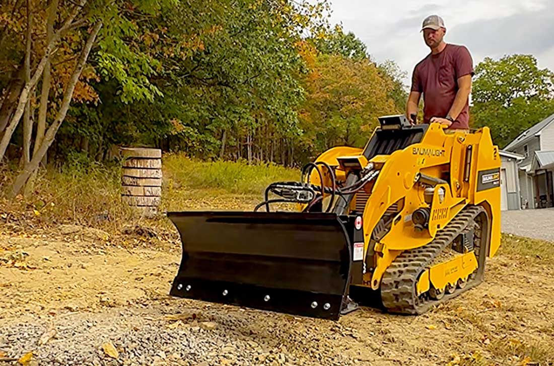 mini skidsteer dozer blade in action