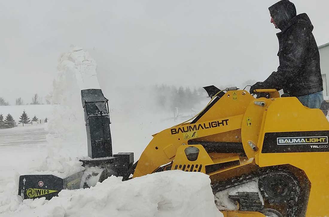 Wifo snowblower attachment on Baumalight miniskidsteer