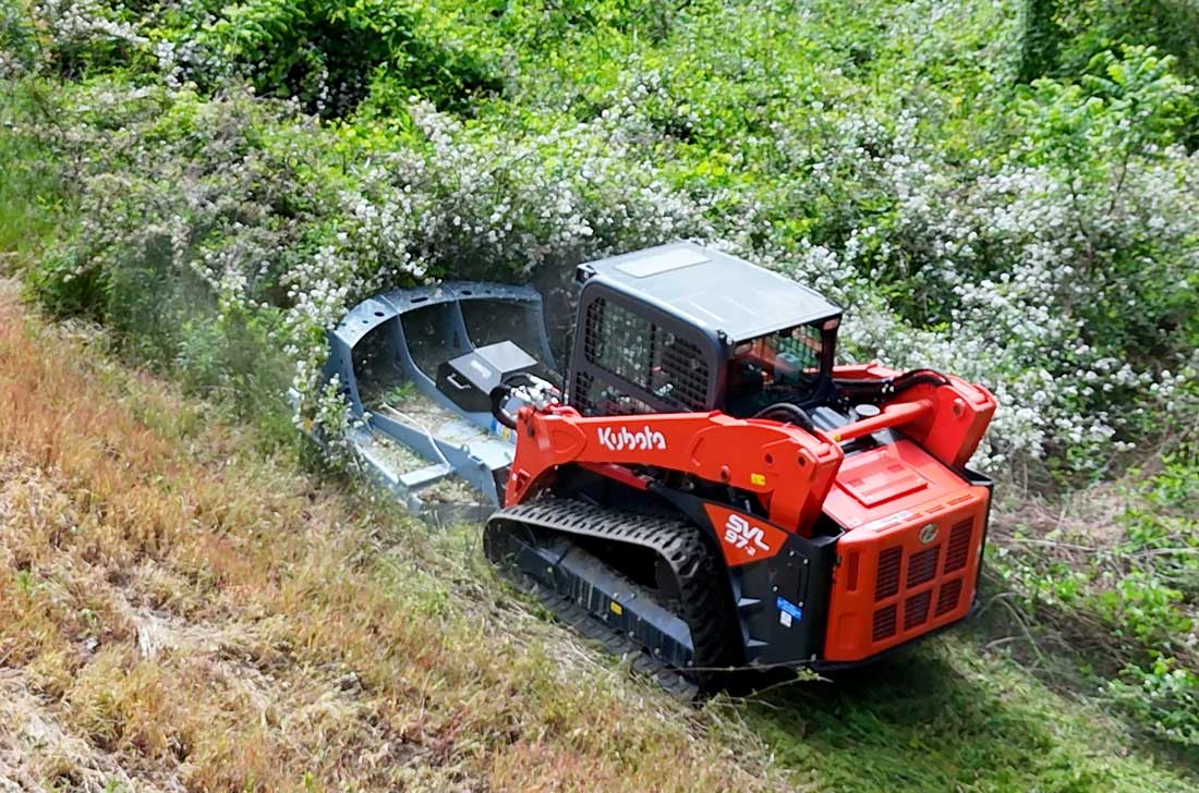 customer with cf772 clearing underbrush