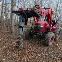 rc582 auger drive mounted on tractor