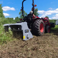field clearing action with mp348 mulcher