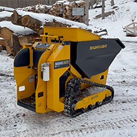 track dumper hauling material in winter