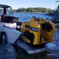 Transporting TRL620D compact utility loader