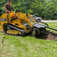 baumalight trencher on trl630d mini skidsteer