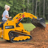 baumalight trl630d with bucket moving mud