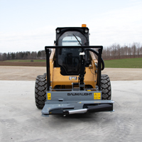 ISR512 tree shear mounted on skidsteer