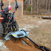 baumalight tn336 trencher mounted on tractor