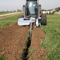 trencher tn548 mounted on a skidsteer