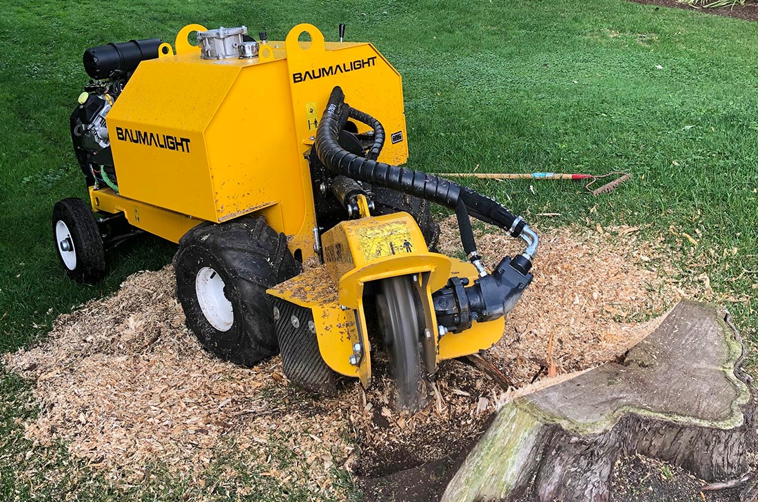 Self propelled stump grinder grinding stumps