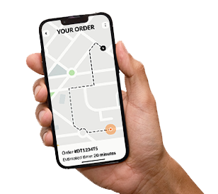 Hand holding a smartphone displaying a map with order tracking details