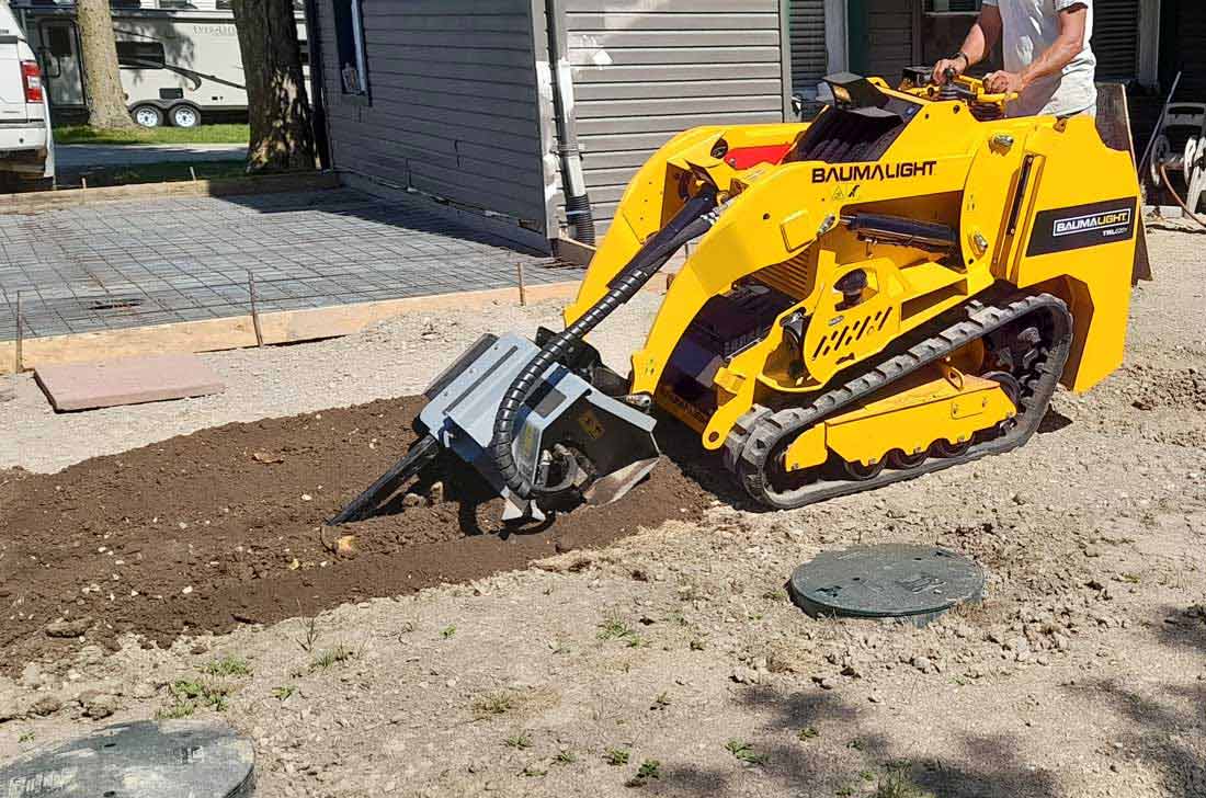 TN236 trencher on baumalight mini skidsteer